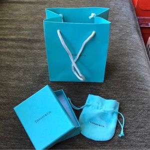 Empty Tiffany & Co. box, felt bag and paper bag